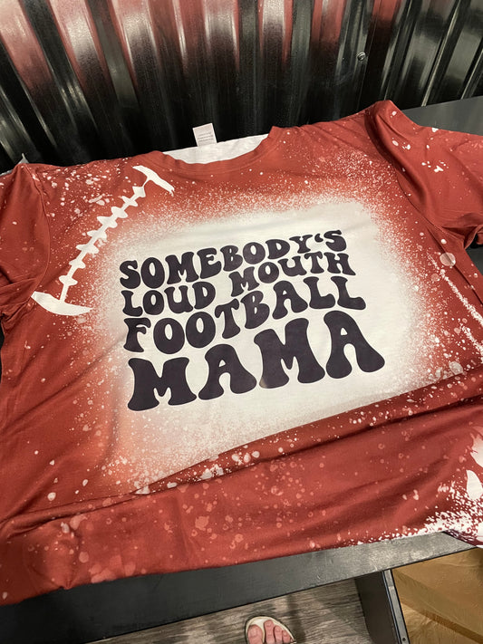 Somebody’s Loud Mouth Football Mama Bleached Teeshirt
